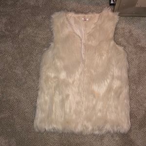 White faux fur vest